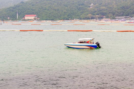 Speed boat in the landscape of sea.