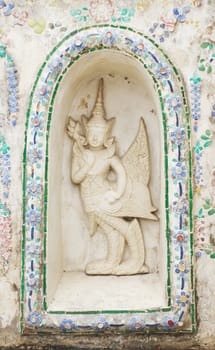 Statue of a kinnaree in Wat Arun wararam, thailand.
