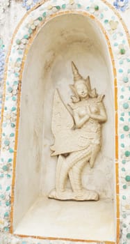 Statue of a kinnaree in Wat Arun wararam, thailand.