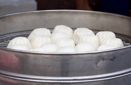 Steamed dumpling in a steamed oven, preparing for sale.