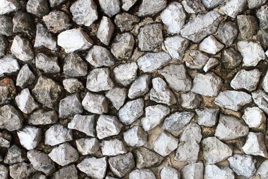 Walls built from natural stone for background image.