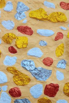 Walls built from natural stone with paint multi color.