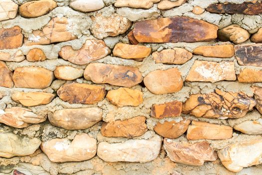 Walls built from natural stone for background image.