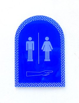 Women and men toilet sign in blue.