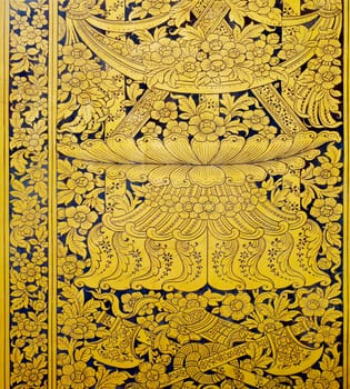 Flower pattern in traditional Thai style art painting on window of the temple.
