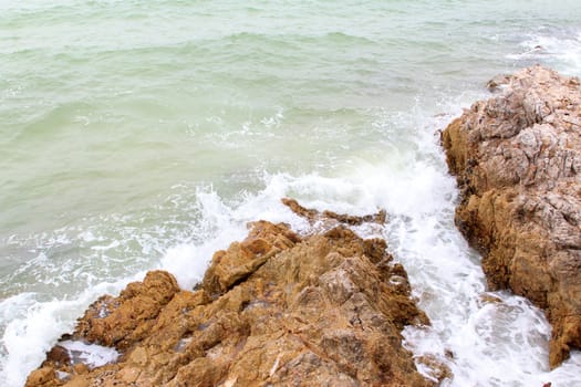 Rock the ocean waves crashing all the time.