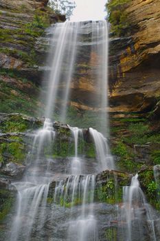 Waterfall coming down on the cliffs