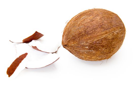 Fresh coconut with pieces on white background