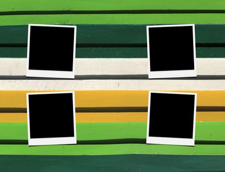 Blank instant photo frames on Wooden floor. 