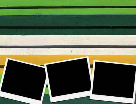 Blank instant photo frames on Wooden floor. 
