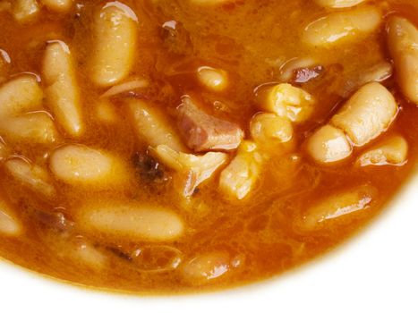 Asturian bean stew dish. Isolated, close-up