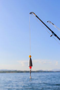 Fishing rods at the ready with blue sky.