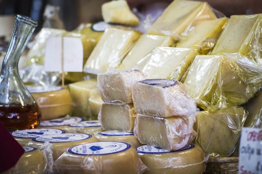 batch of cheese in a medieval fair, artisan cheese