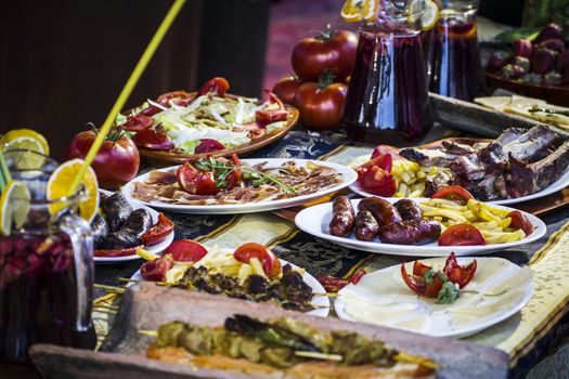 Mediterranean food plates, European cuisine, medieval fair in Spain