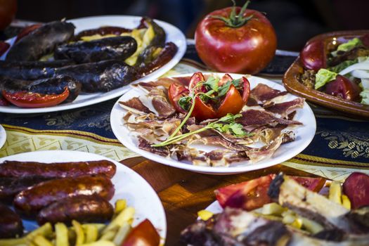 Mediterranean food plates, European cuisine, medieval fair in Spain