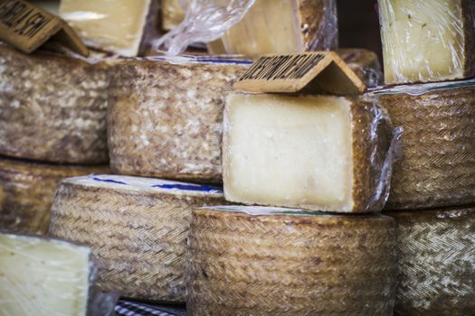 batch of cheese in a medieval fair, artisan cheese