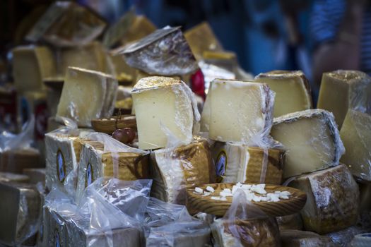 batch of cheese in a medieval fair, artisan cheese