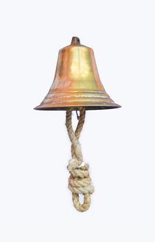 Golden bell tied with rope on white background.