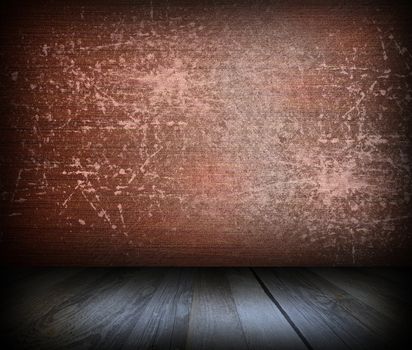 rusty scratched interior backdrop with wood floor and distressed textured wall 