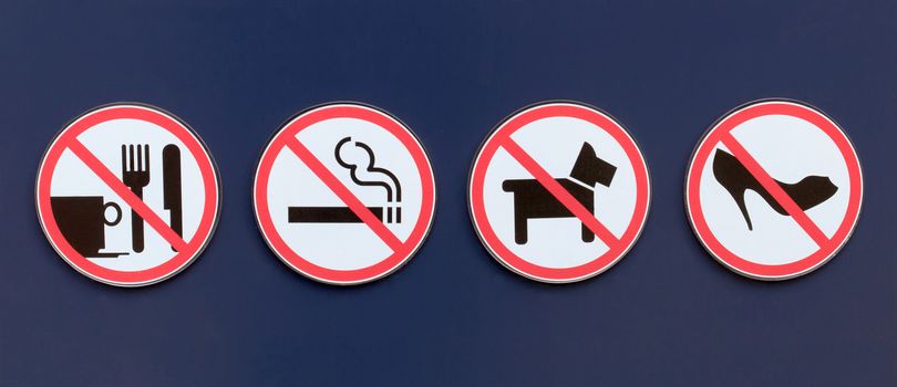 No sign include no eating and drinking, no smoking, no dogs and no high heels.