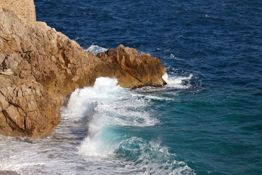 Waves hitting the rocky shore