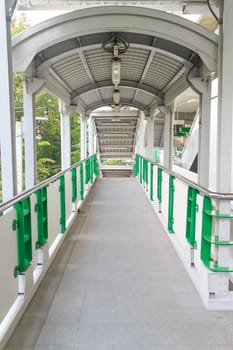 The modern overpass for crossing the road.