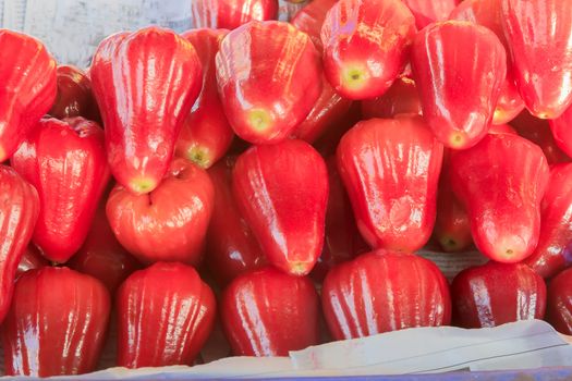 Rose apple put stacked in the market for sale.