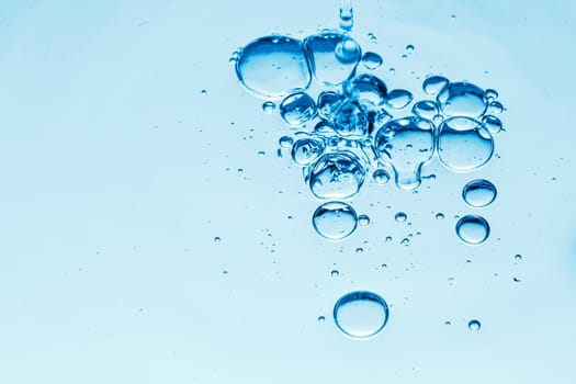 very nice abstract background of blue water drops from splash 