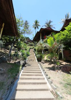 Stairs going up the beach to their homes