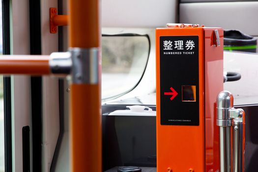 Kawaguchiko, Japan - April 12 A ticket vending machine on the bus transport for tourists to travel around Lake Kawaguchiko and its surroundings on April 12, 2014 in Kawaguchiko, Japan