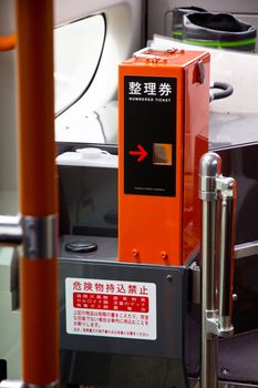 Kawaguchiko, Japan - April 12 A ticket vending machine on the bus transport for tourists to travel around Lake Kawaguchiko and its surroundings on April 12, 2014 in Kawaguchiko, Japan