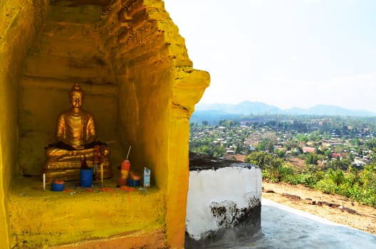 Gloden Phra That on Hill above Village Series 1_1, Buddha Image, Cloud and Blue Sky, Chiang Mai province, Thailand