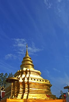 Phra That Sri Jom Thong, Series 1_4, Golden Pagoda with Cloud and Blue Sky.Chiang Mai province,Thailand.
