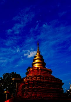 Phra That Sri Jom Thong, Series 1_5, Golden Pagoda with Cloud and Blue Sky.Chiang Mai province,Thailand.