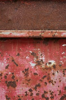 Rusty metal plate background divided into two zones