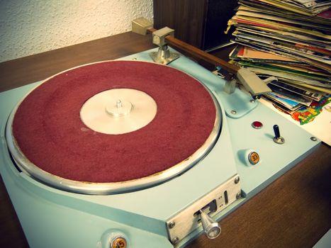 Old vinyl player with Old-fashioned photo effect