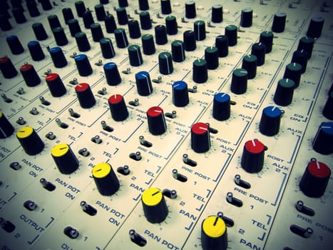 Vintage mixer board. Old fashioned cross processing effects.