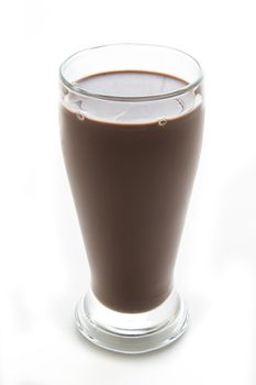 Tall glass of cold chocolate milk