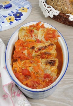 stuffed savoy cabbage under onion-carrot gravy

