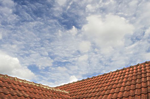 The Tiled Roof with Fluffy Cloud Blue Sky 105