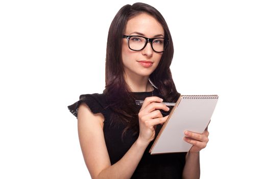 Female university student in glasses with notepad isolated on white