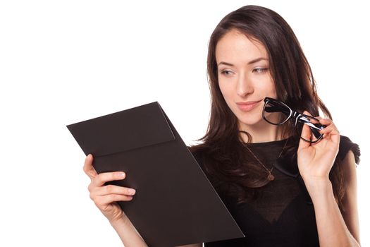 Sexy woman in glasses with clipboard isolated on white