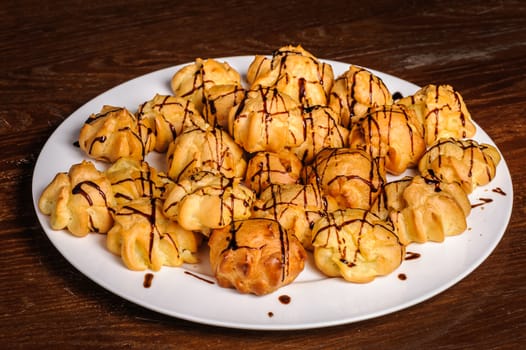 plate of not sweet profiteroles stuffed with seafood