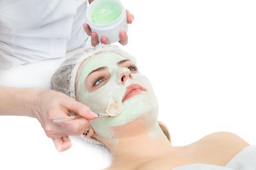 beauty salon, facial mask applying using brush
