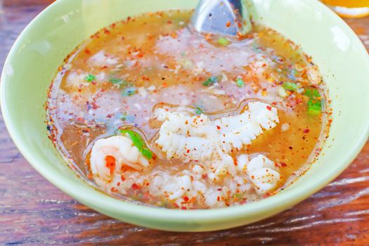 Thai congee with shrimp and squid for breakfast.