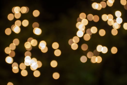 Abstract festive background with bokeh defocused lights.