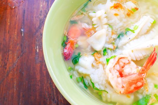 Thai congee with shrimp and squid for breakfast 