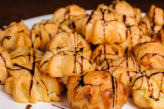 plate of not sweet profiteroles stuffed with seafood