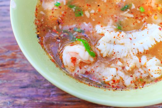 Thai congee with shrimp and squid for breakfast.