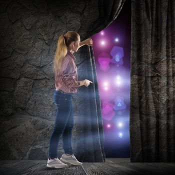 image of a young woman, changes reality, looking at the lights of a stone wall